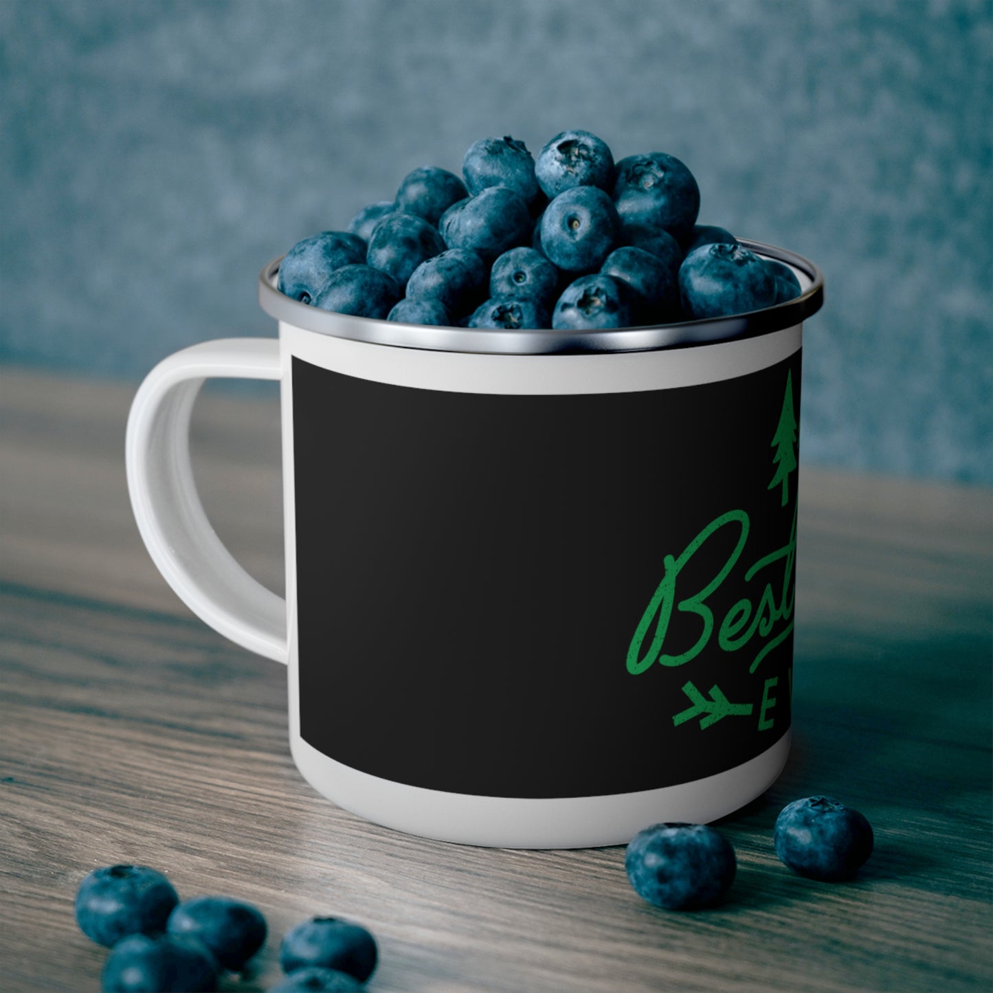 Camping mug filled with berries